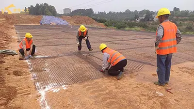 The Savior of Soft Soil Foundations: How Steel-Plastic Geogrids Solve Settlement Problems